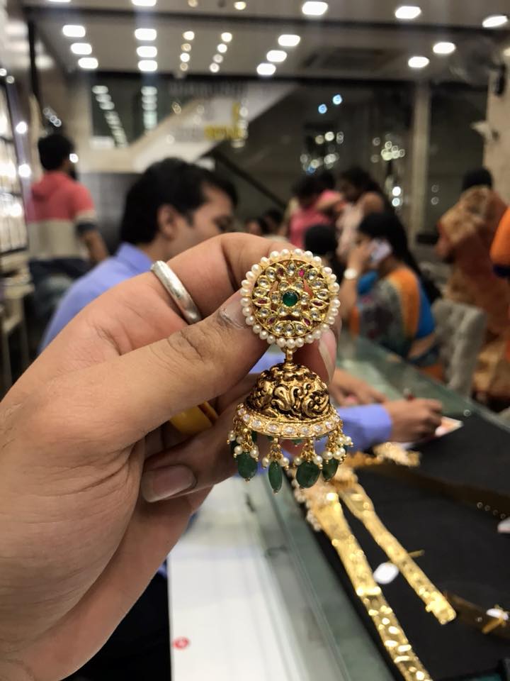 beautiful designs of gold jhumkas