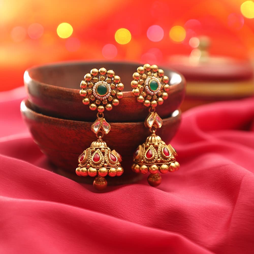 beautiful designs of gold jhumkas