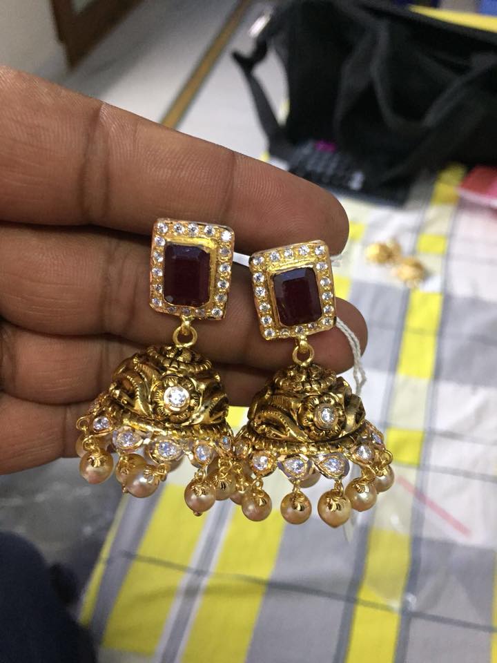 beautiful designs of gold jhumkas