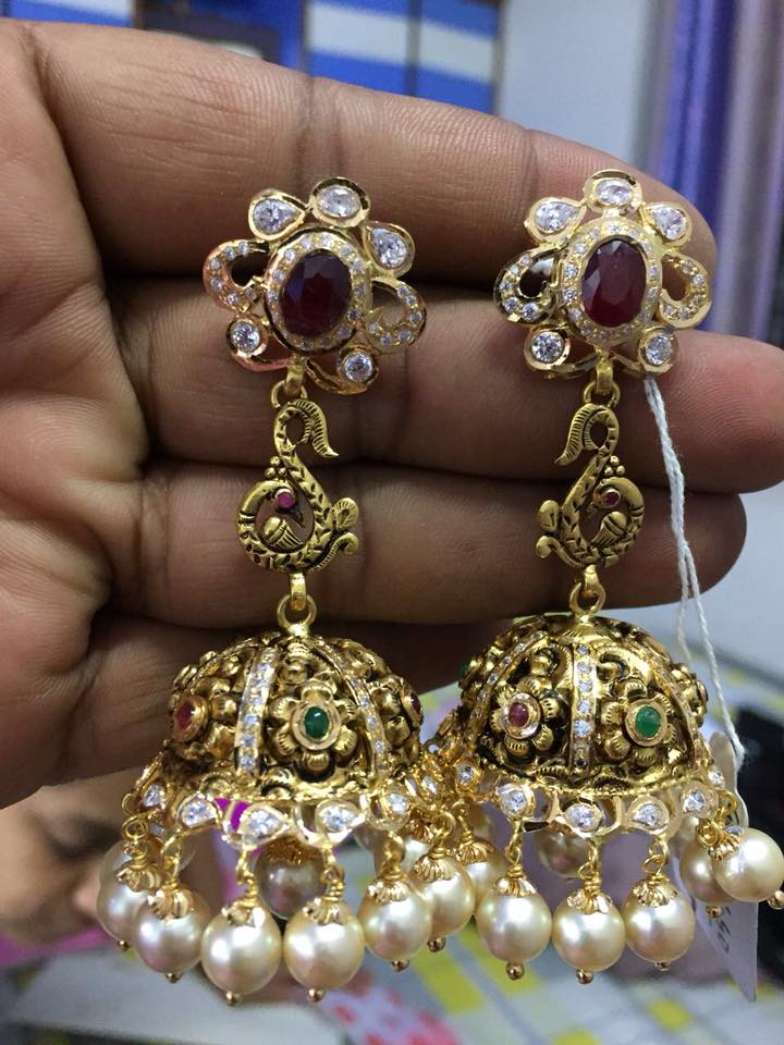 beautiful designs of gold jhumkas