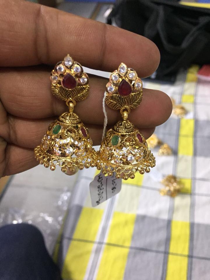 beautiful designs of gold jhumkas