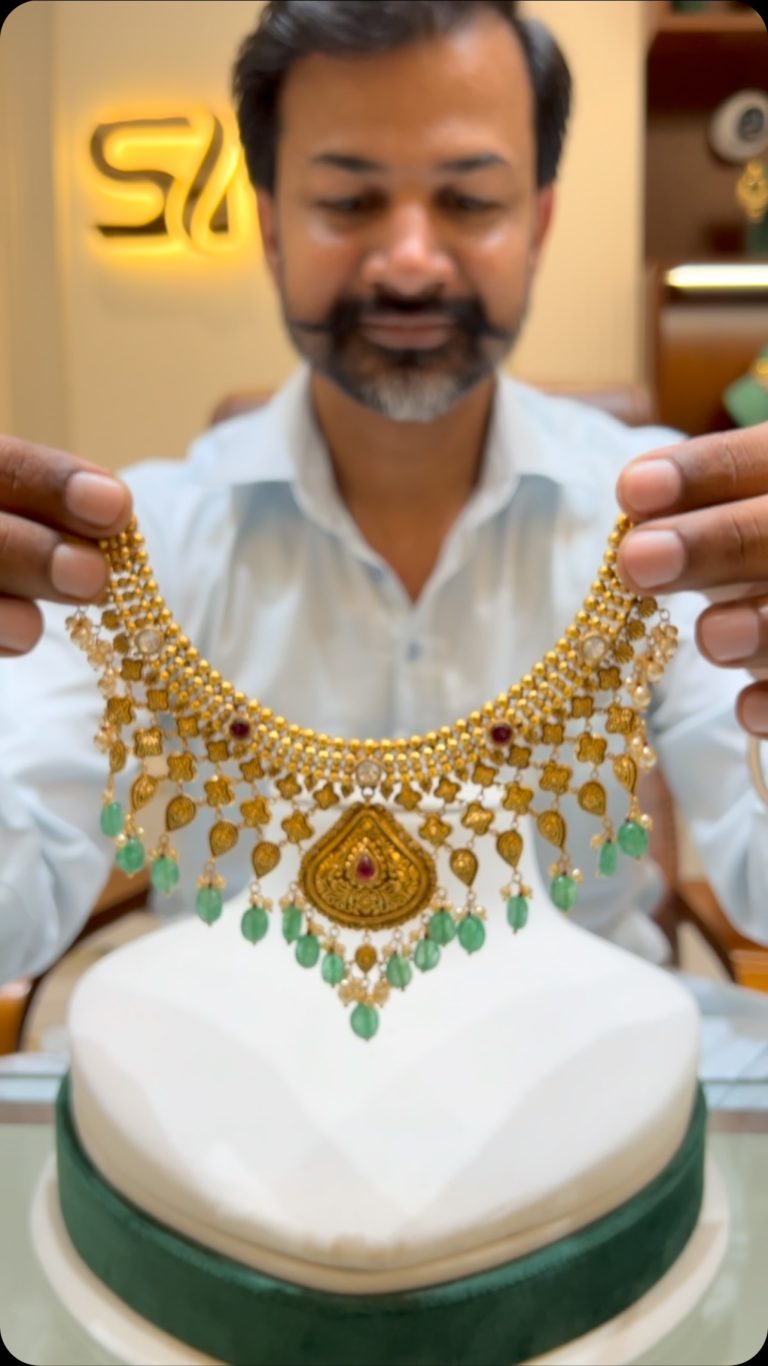 Gold Necklace with Green Beads From ‘Shreemala lakshmi Jewellers’
