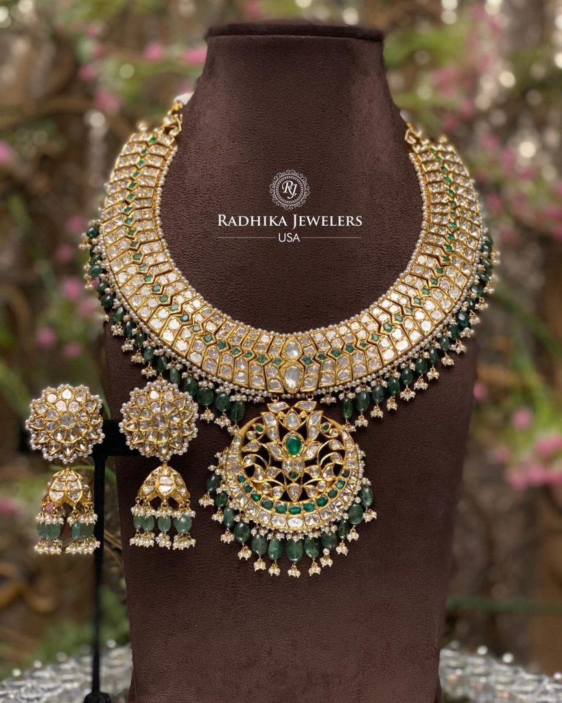 Polki And Kundan Stones Gold Necklace With Pearl Beaded Hanging From 'Radhika Jewellers'