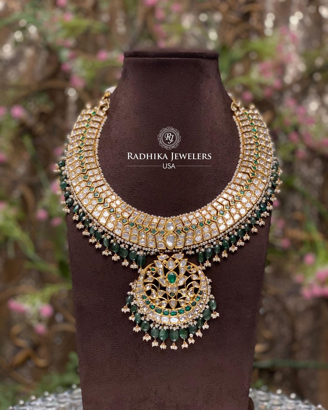 Polki And Kundan Stones Gold Necklace With Pearl Beaded Hanging From 'Radhika Jewellers'