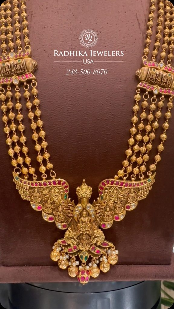 Multilayer Gold Beaded Lakshmi Pendant Long Necklace From 'Radhika Jewellers'