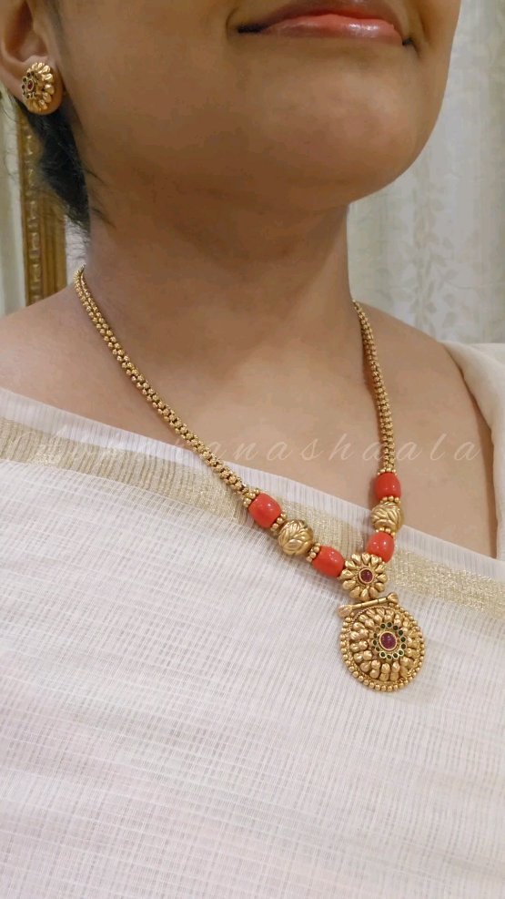 Floral Design Coral with Ruby Green Neckset From 'Abharanashaala'