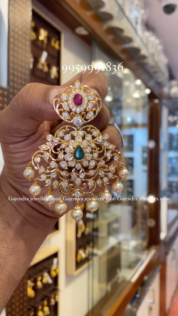 Beautiful Gold White Stones Pendant From 'Gajendra Jewellers'