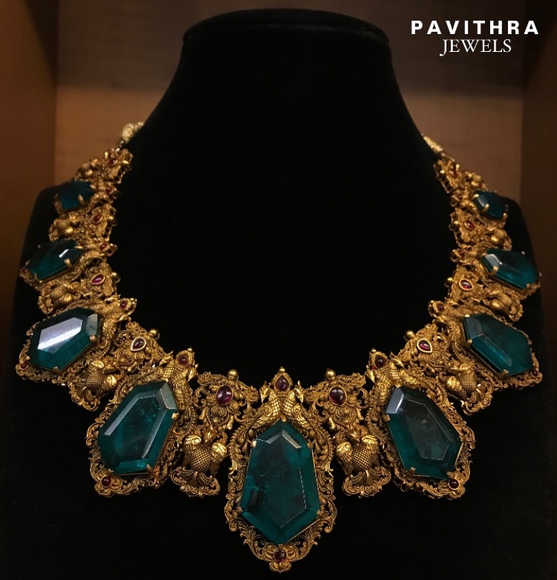 Gold Necklace Studded with Emeralds & Rubies From 'Pavithra Jewels'