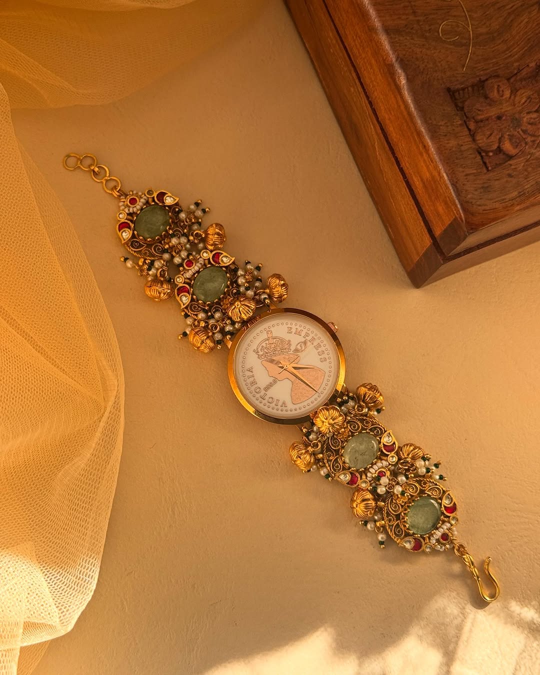 Gold Plated Colored Stones And Pearl Analog Watch From 'Mangalsutra Bangles'