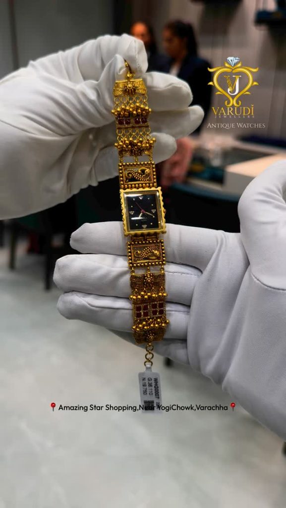 Gold Analog Watch From 'Varudi Jewellers'