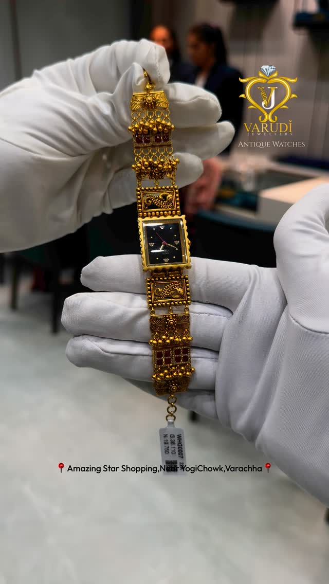 Gold Analog Watch From 'Varudi Jewellers'
