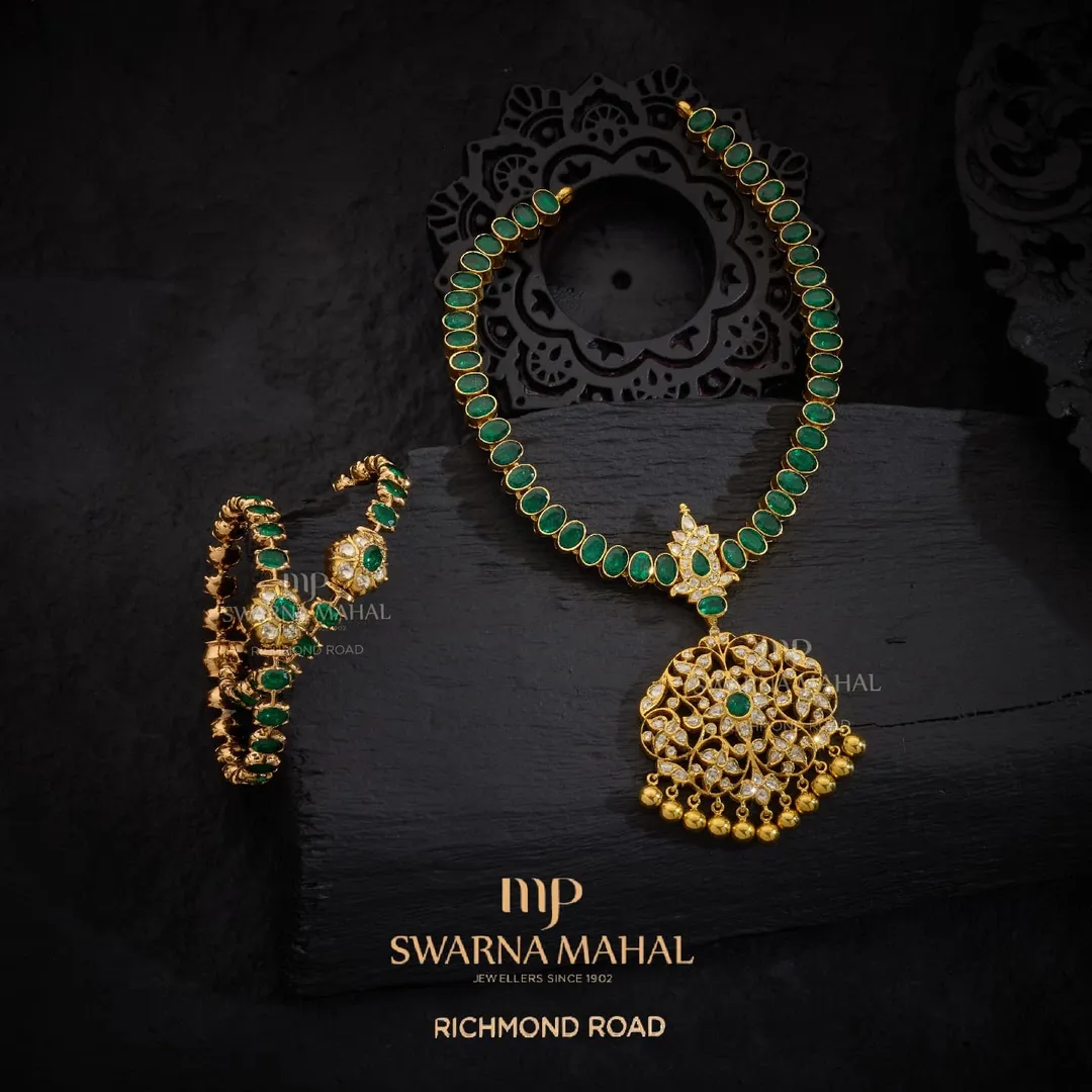 Gold Emerald Stone Jewellery Set From 'MPSwarna Mahal'